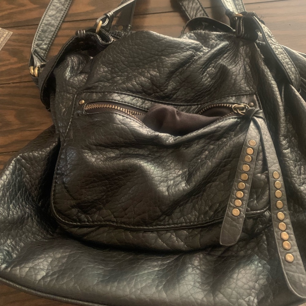 Great looking bag! Barley used if at all.